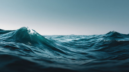 Experience the peacefulness of ocean waves gently rolling under soft light. This serene seascape captures the beauty and tranquility of nature's watery expanse.の素材
