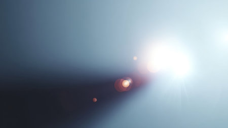 This abstract image showcases a striking light beam cutting through darkness, creating a soft glow and colorful flares, evoking a sense of tranquility and creativity.の素材