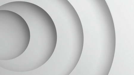 This abstract image features a smooth surface with layered grey circles creating a minimalistic and modern design, perfect for artistic backgrounds and clean aesthetics.の素材