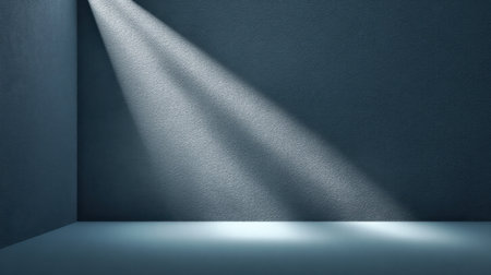 A serene corner scene showcasing a subtle light beam illuminating a textured wall, perfect for creative projects and modern design themes.の素材