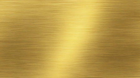 This image showcases a stunning polished gold metal surface featuring a subtle brushed finish, perfect for adding a touch of elegance and luxury to various design projects.の素材