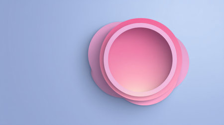 This abstract image features layered circular shapes in soft pink hues against a light blue background, ideal for modern art projects and minimalist design needs.の素材