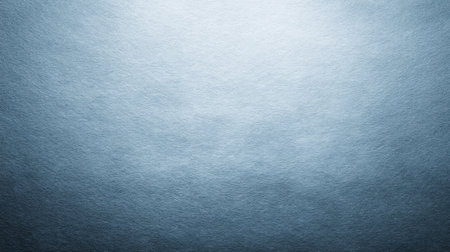 This image features a smooth, reflective blue metallic texture that offers a modern and minimalistic background ideal for various creative projects and design applications.の素材
