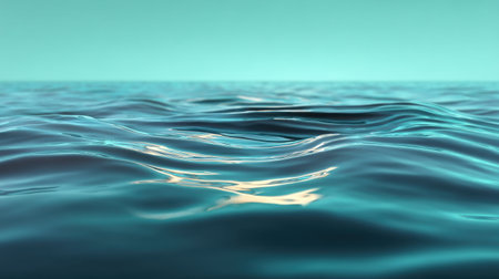 A mesmerizing view of gentle ocean waves under a soft turquoise sky, showcasing nature's beauty and inviting calmness for relaxation and meditation.の素材