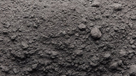 A close-up view of a fine gray powder surface featuring a unique texture suitable for backgrounds in design and photography. Ideal for creative projects.の素材