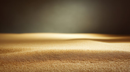 This image captures the serene beauty of a soft sand dune, highlighting gentle curves and a gradual light transition, creating a tranquil atmosphere ideal for various uses.の素材
