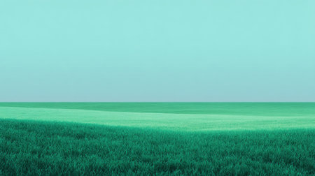 A stunning view of a vast green landscape meeting a calm sky creates a serene atmosphere, perfect for conveying peace and tranquility in natural settings.の素材