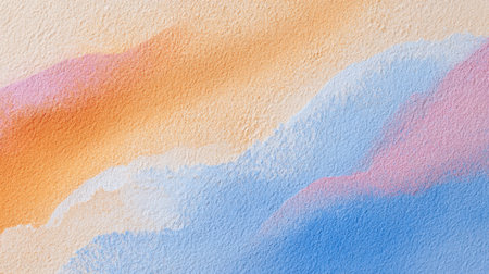 A beautiful abstract wall texture featuring soft pastel shades of orange, pink, and blue. Perfect for backgrounds in artistic, creative, and modern projects.の素材