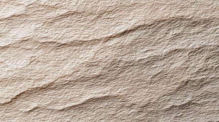 This close-up image showcases a textured surface of natural paper featuring subtle waves and earthy tones, perfect for backgrounds, crafts, and creative projects.の素材