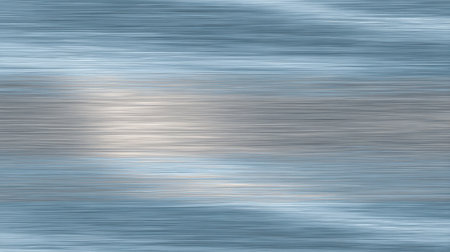 This soft blue and gray abstract background features subtle light effects, perfect for graphic design, presentations, or as a serene backdrop for various projects.の素材