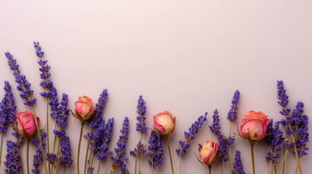 A stunning arrangement of pink roses and lavender flowers resting elegantly on a soft pink background, perfect for home decor, design inspiration, or leisurely aesthetics.の素材