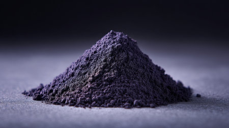 A striking close-up image of a pile of purple powder on a textured surface, showcasing vibrant color and intricate details enhanced by soft shadows for visual interest.の素材