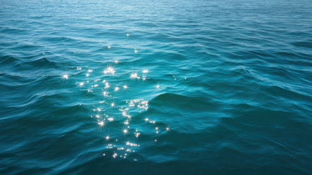 Capturing the essence of calmness, this image portrays shimmering ocean waves reflecting sunlight, evoking a sense of peace and natural beauty in a serene aquatic landscape.の素材