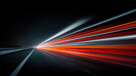 Captivating night scene featuring dynamic light trails on a road, showcasing movement and speed in an urban setting against a moody sky, perfect for creative projects.の素材