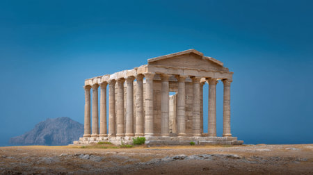 Explore an ancient Greek temple ruin featuring majestic columns under a clear blue sky. This serene landmark evokes rich history and timeless architectural beauty.の素材