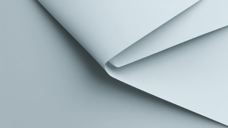 This image captures the beauty of soft blue paper with gentle curves, designed to serve as an elegant and versatile background for various creative projects.の素材