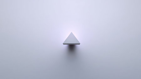 A minimalist triangle shape rests on a soft white background, creating a harmonious balance of light and shadow, perfect for modern design inspiration and abstract concepts.の素材
