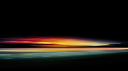 Dynamic light trails create a vibrant abstract scene against a dark night sky, capturing the essence of motion and energy in urban settings. Ideal for modern visuals.の素材