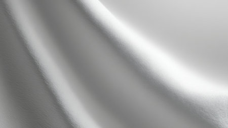 This image showcases a smooth, soft white fabric with subtle curves, perfect for backgrounds, fashion designs, or artistic projects that require elegance and simplicity.の素材