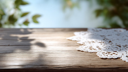 Explore a serene setting with a rustic wooden table featuring a delicate lace napkin. Soft natural light enhances the tranquil atmosphere, perfect for relaxation.の素材