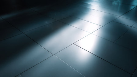 Capture the essence of modern design with this image of a smooth tiled floor reflecting soft light, creating a captivating and elegant atmosphere in a contemporary space.の素材