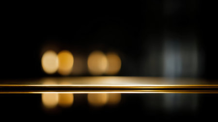 A captivating image of a glowing surface reflecting soft lights in a dark environment, creating an abstract and artistic atmosphere for various design projects.の素材