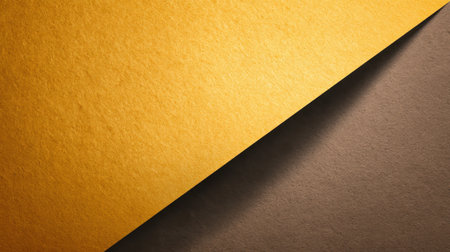 A beautiful composition featuring textured yellow and brown paper, showcasing dynamic lighting and shadows. Perfect for backgrounds, crafts, and design projects.の素材