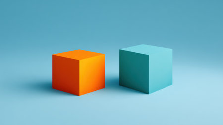 Two distinct geometric cubes, one in vibrant orange and the other in soothing blue, sit on a minimalist background, capturing modern simplicity and creative inspiration.の素材