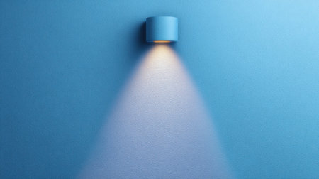 This image showcases a sleek blue wall enhanced by minimalist lighting that creates a soft gradient shadow, adding a touch of modern elegance to any interior space.の素材