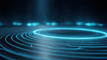 This abstract image features a mesmerizing blue glow with circular lines, creating a futuristic ambiance. Perfect for technology or science-related themes.の素材