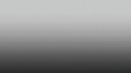 A sleek monochrome gradient background smoothly transitions from light grey to deep black, ideal for digital projects, minimalist designs, and artistic expressions.の素材