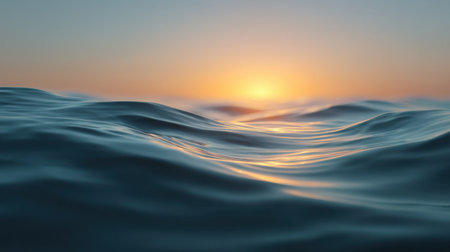 Captivating view of gentle ocean waves at sunrise, showcasing the soft colors and serenity of nature, perfect for evoking calm and relaxation in imagery.の素材