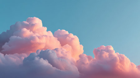 Captivating view of soft pink clouds against a clear blue sky at sunset, showcasing the beauty and tranquility of nature's color palette in a serene atmosphere.の素材