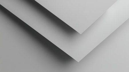 A striking abstract image of layered gray paper sheets, highlighting texture and light interplay. Perfect for design backgrounds, creative projects, and modern aesthetics.の素材