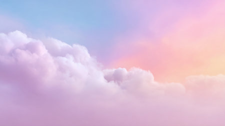 A beautiful view of soft pastel clouds at sunrise, showcasing a blend of pink, purple, and blue hues in a calm and serene sky, perfect for artistic projects.の素材
