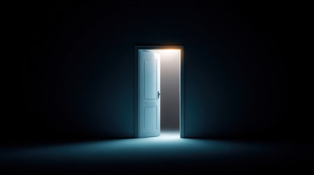 A softly illuminated open door in a dark room symbolizes hope and opportunity. This image conveys emotions of new beginnings and potential adventures.の素材