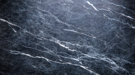 Discover a stunning dark marble surface featuring unique natural veins and textures. Ideal for interior design projects, flooring, or stylish backgrounds.の素材