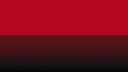 A striking abstract background featuring a smooth gradient transition from vibrant red to deep black. Perfect for bold designs, digital media, and artistic projects.の素材