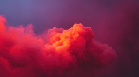 This striking image features a colorful smoke cloud showcasing vibrant hues of red and purple. It creates a dramatic atmosphere perfect for artistic backgrounds.の素材