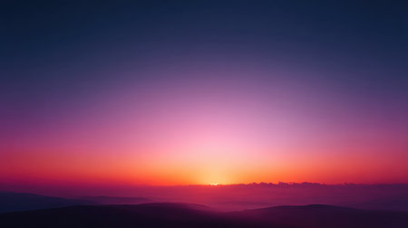 Experience a stunning sunset that paints the sky with vibrant hues, casting a serene ambiance over rolling hills and creating a picturesque landscape for reflection.の素材