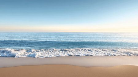A breathtaking view of calm ocean waves lapping on a serene beach at sunset, perfect for evoking relaxation and tranquility in any project.の素材