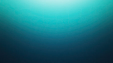 A serene blue gradient background featuring soft light effects. Perfect for creating a calm atmosphere in designs, wallpapers, or artistic projects.の素材