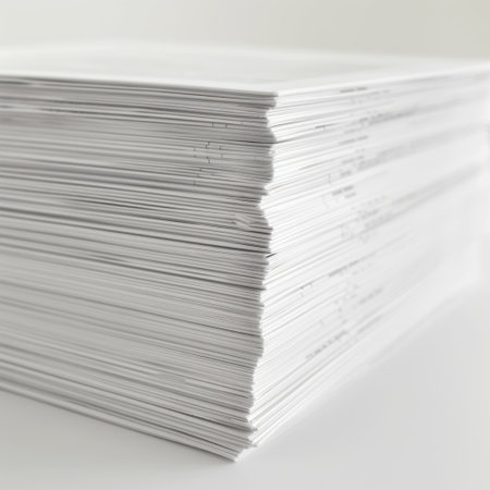 A close-up view of neatly stacked sheets of blank paper, showcasing a clean and minimalistic design. Perfect for office, stationery, and creative projects.の素材