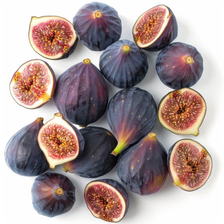 A vibrant assortment of fresh ripe figs, showcasing their rich purple skin and intricate interior. Ideal for culinary projects, health promotions, and food photography.の素材