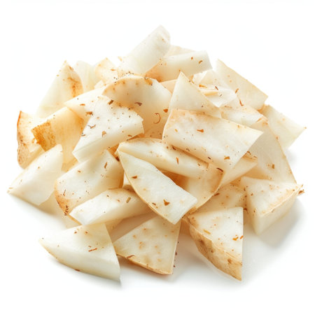 A vibrant assortment of freshly cut white root vegetable slices showcasing a clean and natural appearance, ideal for culinary projects and healthy recipe designs.の素材