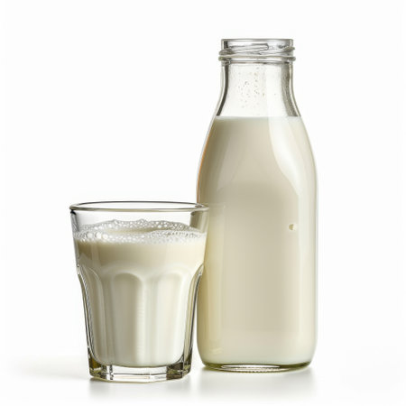 A classic representation of fresh milk served in a glass with a bottle nearby. Perfect for illustrating healthy drinks, cooking ingredients, and nutrition-focused lifestyles.の素材