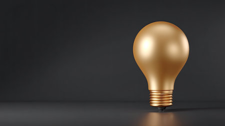 A striking golden light bulb stands out against a dark backdrop, symbolizing creativity and innovation. Perfect for any project seeking elegance and inspiration.の素材