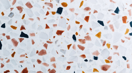 Discover a vibrant terrazzo pattern featuring colorful stones set against a light background, ideal for enhancing various interior design and decoration projects.の素材