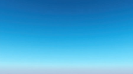 This image showcases a stunning gradient sky that transitions from light to deep blue hues, ideal for backgrounds in various design and artistic projects.の素材