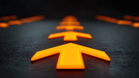 A set of vivid orange arrows positioned on a dark textured background, symbolizing guidance and direction. Perfect for themes of navigation and travel inspiration.の素材